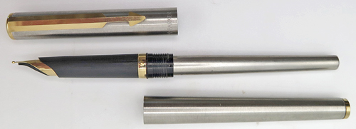 ITEM #4792: PARKER ARROW FLIGHTER FOUNTAIN PEN + TWIST PENCIL SET. BRUSHED STAINLESS STEEL WITH GOLD PLATED TRIM. FOUNTAIN PEN HAS MEDIUM "PARKER" GOLD NIB. PARKER SQUEEZE FILLING UNIT IN PEN.